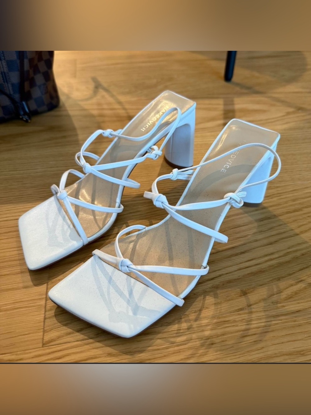 Nakedvice the JAS white strapped heels